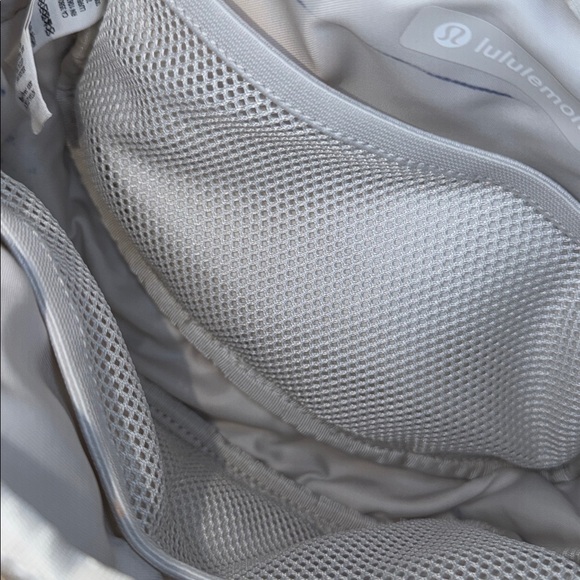 Lululemon EUC cream Crossbody bag with lots of storage. Clean in and out. - Picture 6 of 8